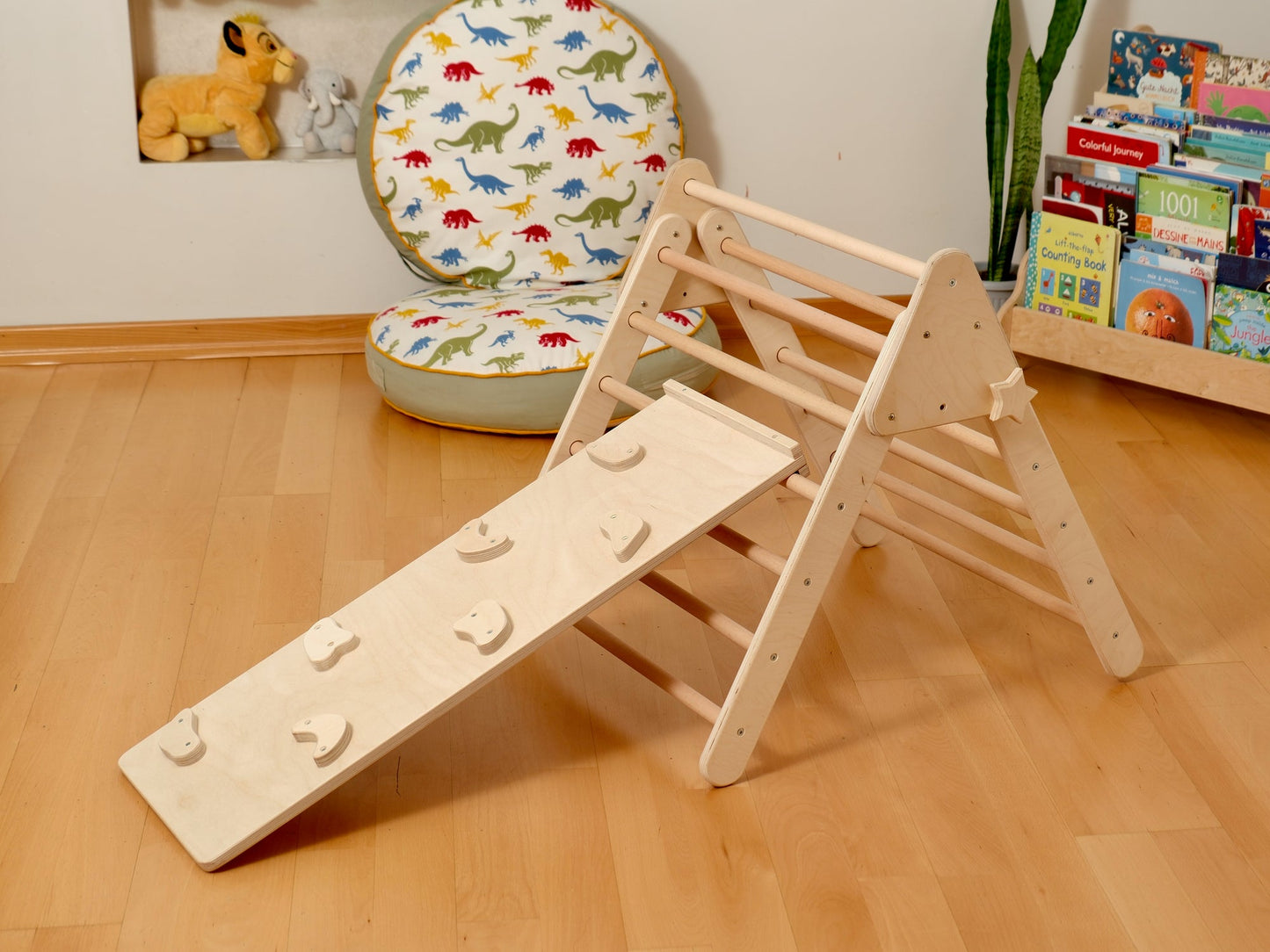 Montessori indoor playground set with Pikler triangle and slide for toddlers, fostering active play and learning.