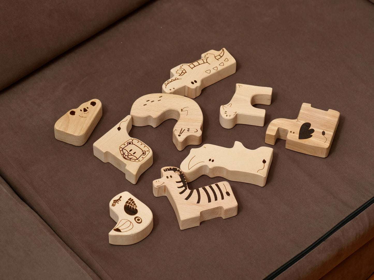 Wooden animal puzzle pieces for toddlers, ideal for Montessori learning and exploring wildlife skills.