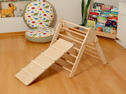 Montessori indoor playground set featuring a Pikler triangle, climbing arch, and slide for toddler fun.