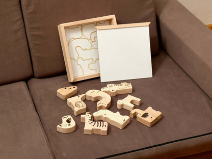 Wooden Safari Animal Puzzle Box with handcrafted animal pieces for toddler learning and play.