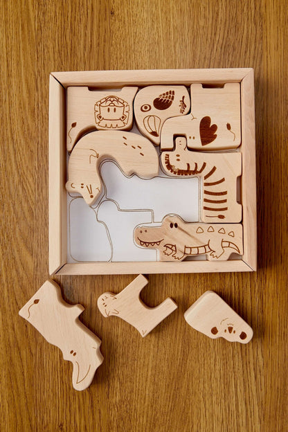 Wooden safari animal puzzle box with cute animal shapes for toddlers' learning play.