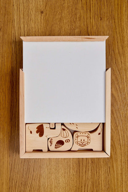 Wooden Safari Animal Puzzle Box for toddlers with beautifully crafted animal shapes inside.