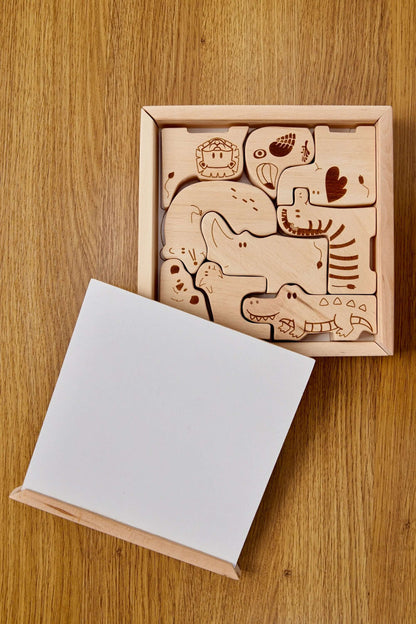 Wooden Safari Animal Puzzle Box for toddlers featuring handcrafted animal pieces on a wooden base.